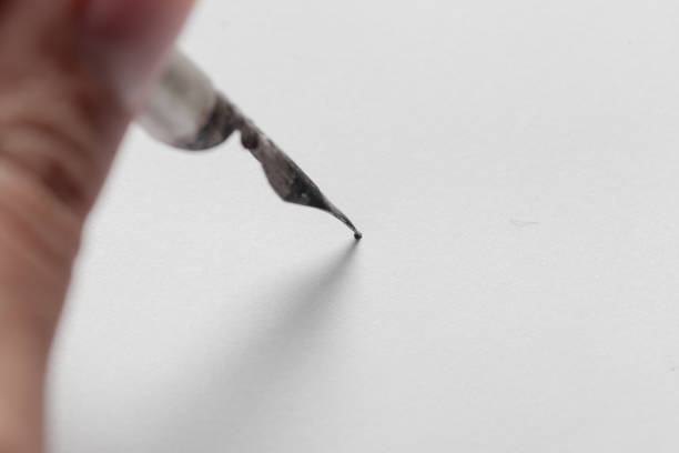 istock Antique fountain pen writing 1154349926