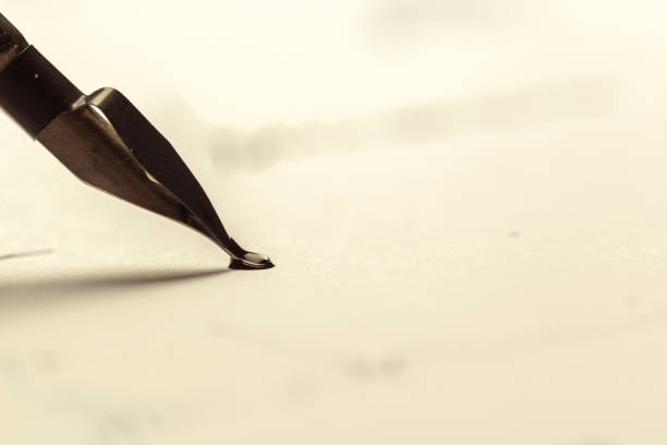 istock Antique fountain pen writing 1154349951