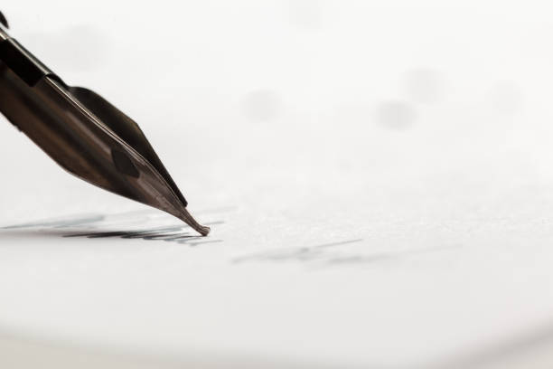istock Antique fountain pen writing 1154349971