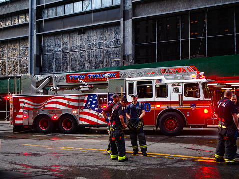 New York - United States, May 25, 2015 - New York firefighters working during an emergency in Manhattan