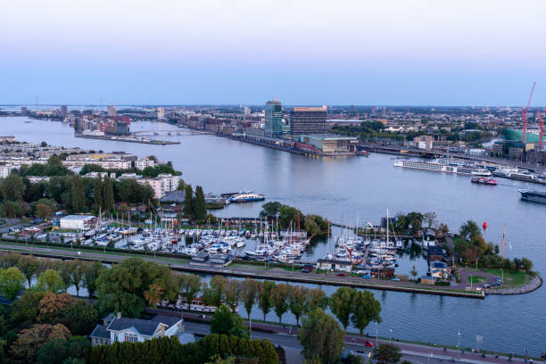 istock Amsterdam cityscape over the river IJ, Amsterdam, Netherlands 1154351857
