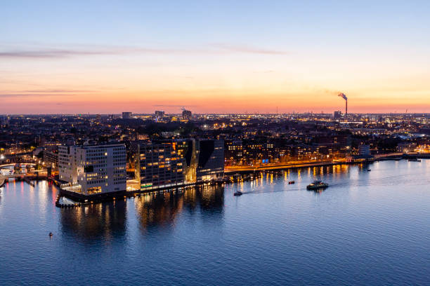 istock Amsterdam cityscape over the river IJ, Amsterdam, Netherlands 1154351915