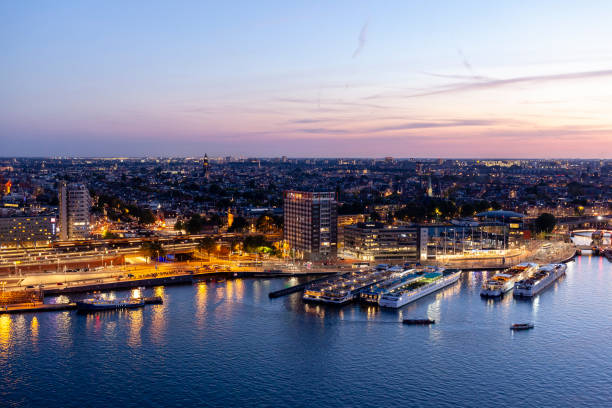 Amsterdam, Netherlands - May 18, 2018: Four Star Movenpick Hotel Building and Contemporary Music Concert Hall Bimhuis Jazz Club at Piet Heinkade Street in City Centre.