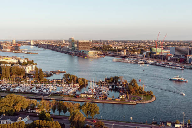istock Amsterdam cityscape over the river IJ, Amsterdam, Netherlands 1154353129