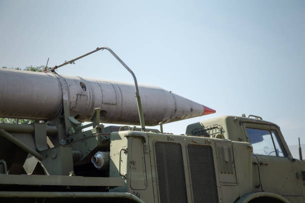 istock rocket mounted on a large army truck and ready to launch 1154356021