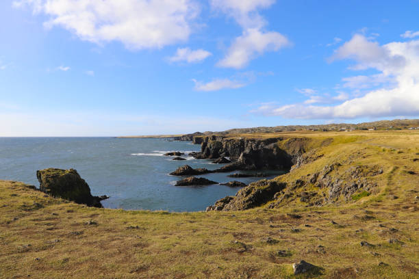 istock Scenic landscape with cliffs and ocean in the West Iceland. 1154359279