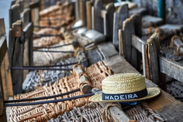 Straw hat on a toboggan in Madeira