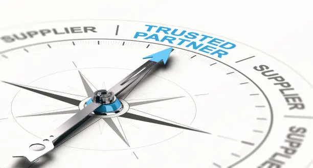 3D illustration of a compass with needdle pointing the text trusted partner. Concept of trustworthy partnership.