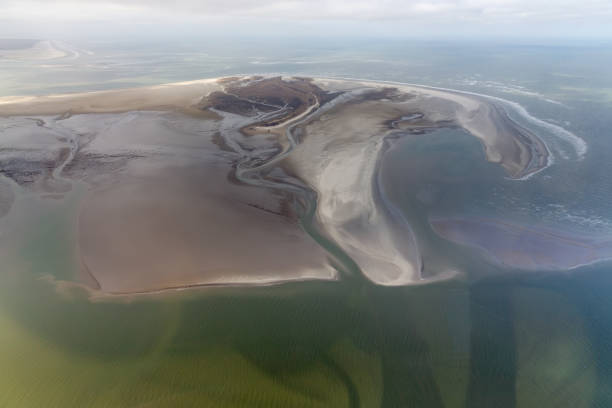 istock Aerial view Dutch island Rottumerplaat, coastline with mudflats and channels 1154362979