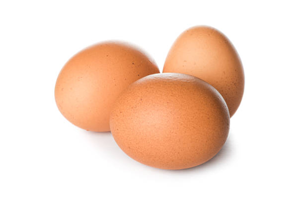 istock Brown chicken eggs isolated on white background 1154369296