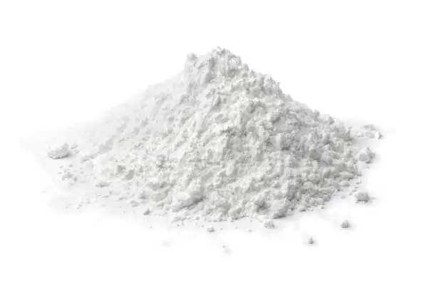 Heap of white corn starch isolated on white background