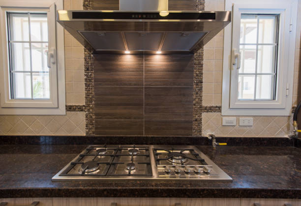 istock Modern kitchen cooker hob in a luxury apartment 1154370418