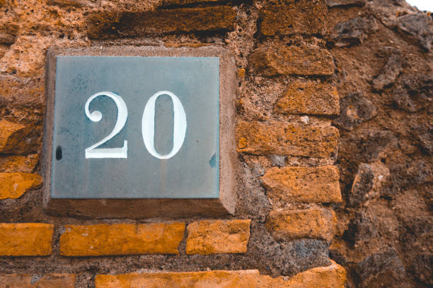 istock handmade sign of number 20 on brown background 1154372334
