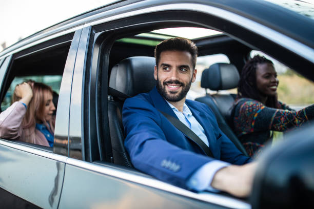 istock Group of friends ride sharing together 1154373518