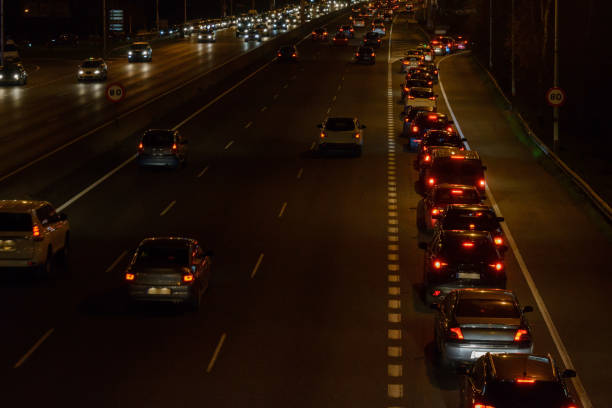 istock car traffic at night on the road 1154374490
