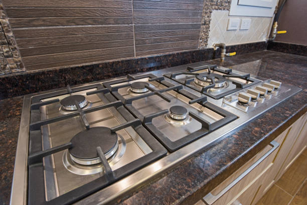istock Modern kitchen cooker hob in a luxury apartment 1154375762