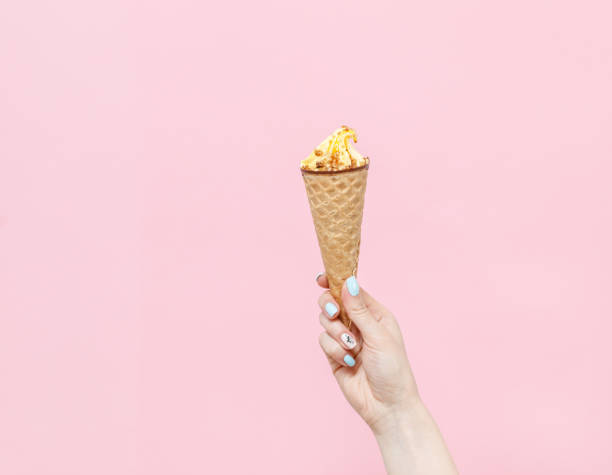 istock Ice Cream in a waffles cone on color background. 1154377762