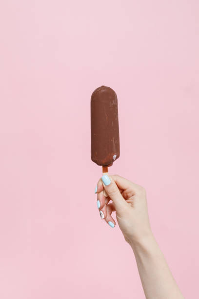 istock Ice Cream in a waffles cone on color background. 1154377774