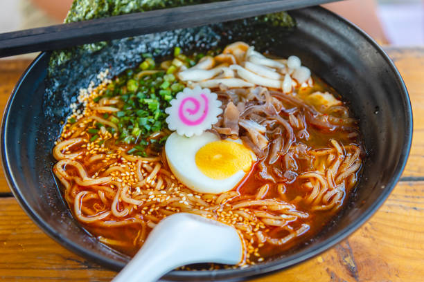 Spicy Japanese ramen noodle soup with egg, Japanese food culture. Spicy Japanese ramen noodle soup with egg, Japanese food culture. miso sauce stock pictures, royalty-free photos & images