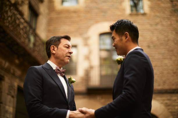 istock Gay couple engagement portraits. 1154383949
