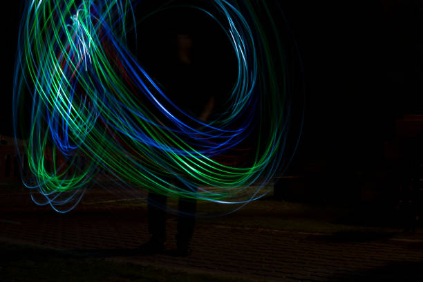 istock Light bulbs and colored lights that are rotating 1154387896