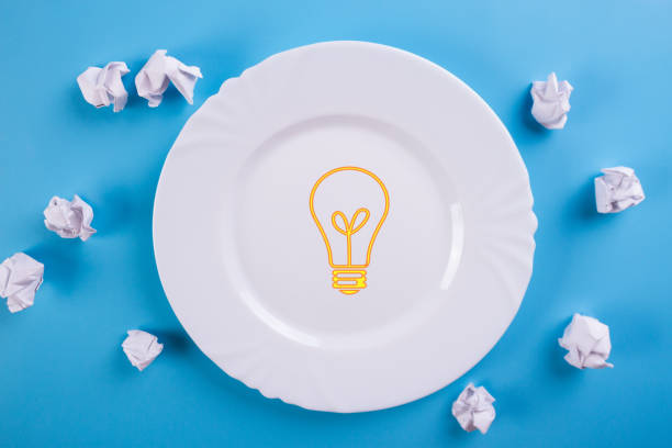 istock Idea Concepts Light Bulb with Crumpled Paper 1154393510