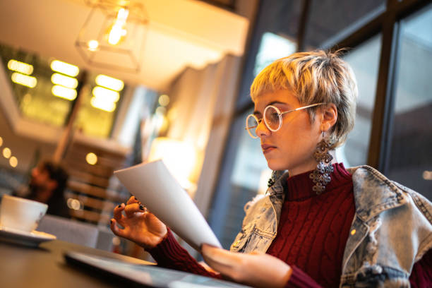istock Latin woman checking some graphics from digital investment 1154396792