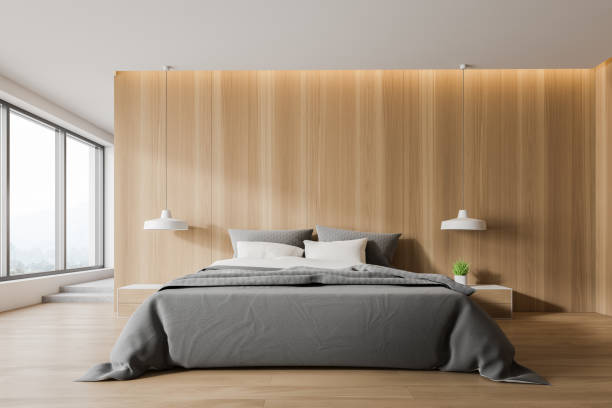 istock White and wooden bedroom interior with stairs 1154396942
