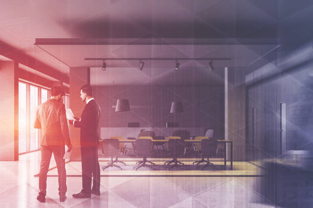 istock People in gray meeting room interior 1154398023