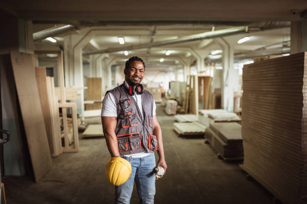 African American male team leader, carpenters African American male team leader, carpenters carpenter portrait stock pictures, royalty-free photos & images