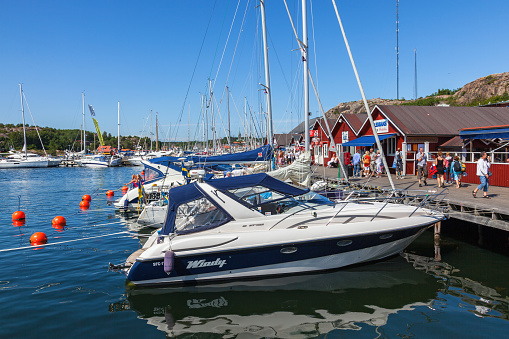 Grebbestad, Sweden - July 14, 2016:  Boats and people on the bridge in Grebbestad on the Swedish west coast