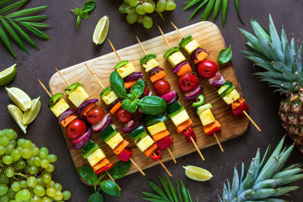 istock Vegetarian kebabs on wooden board 1154399915