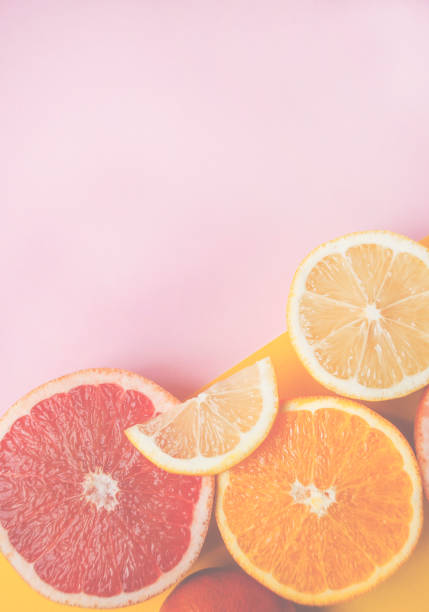 istock Many citrus fruits on blue background. 1154400023