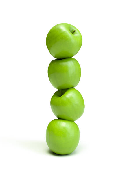 Green apples stacked stock photo