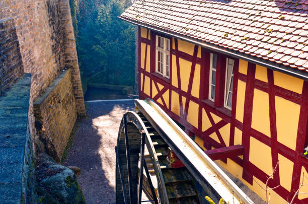 istock Old mill with half-timbered house next to a city wall on Lake Constance 1154407913