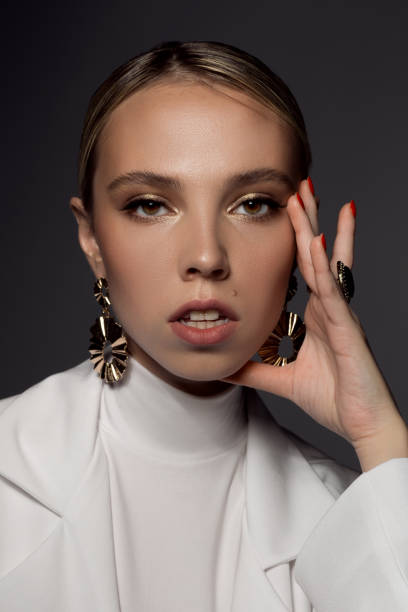 istock Modern bride wearing gold earrings 1154409335