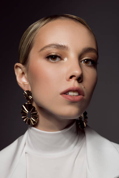 istock Modern bride wearing gold earrings 1154409374