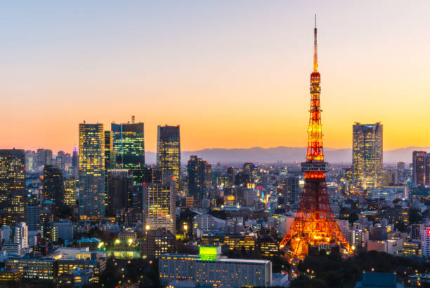 istock Tokyo skyline city scape at sunset with tower. 1154411114