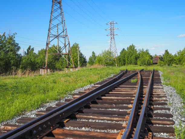 istock Industrial branch railway in the countryside 1154415201