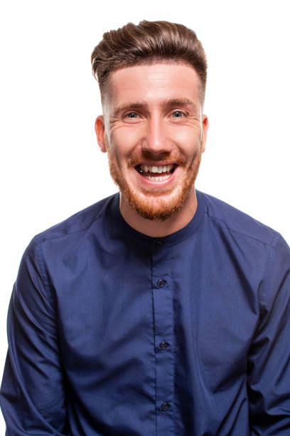 istock Attractive young man wearing blue shirt, isolated over a white background. 1154415918