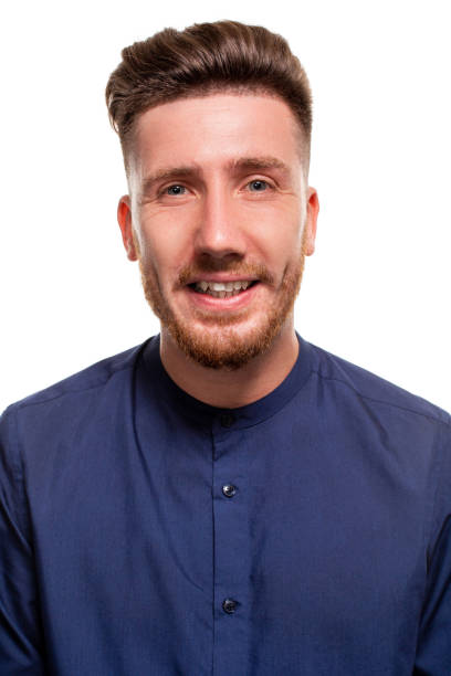 istock Attractive young man wearing blue shirt, isolated over a white background. 1154415920