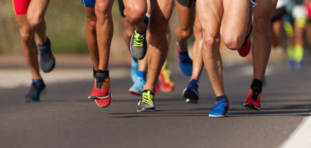 marathonlauf - human foot running jogging human leg stock-fotos und bilder