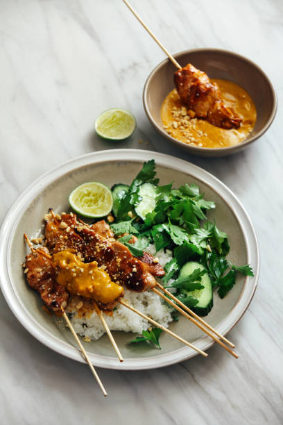 istock Thai chicken satay with peanut sauce 1154425017