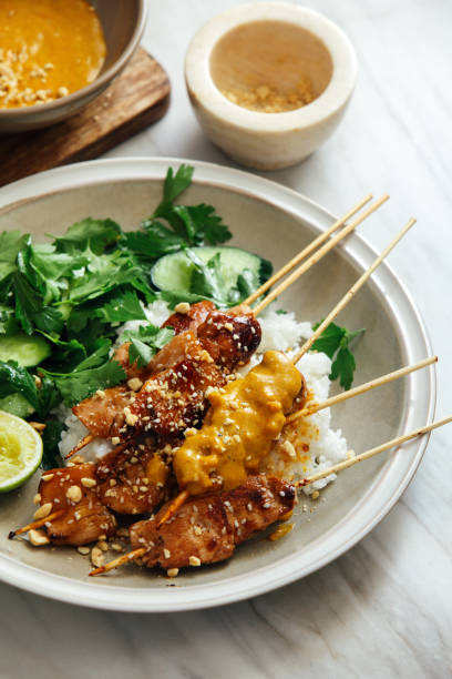 istock Thai chicken satay with peanut sauce 1154425052