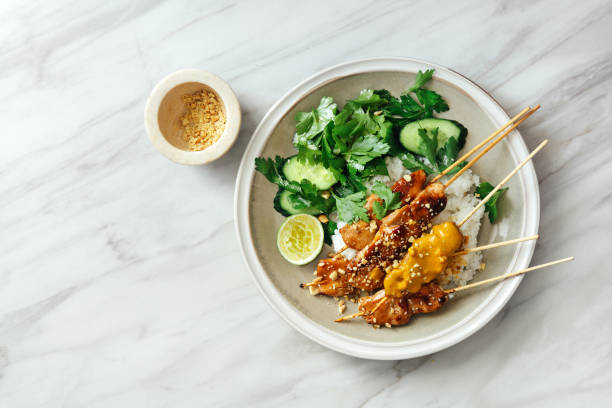 istock Thai chicken satay with peanut sauce 1154425063