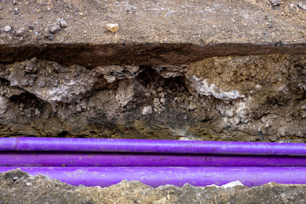 Installing pipes below the street surface