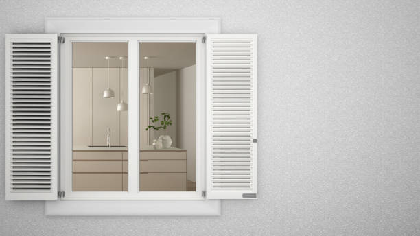 istock Exterior plaster wall with white window with shutters, showing interior modern kitchen, blank background with copy space, architecture design concept idea, mockup template 1154425200