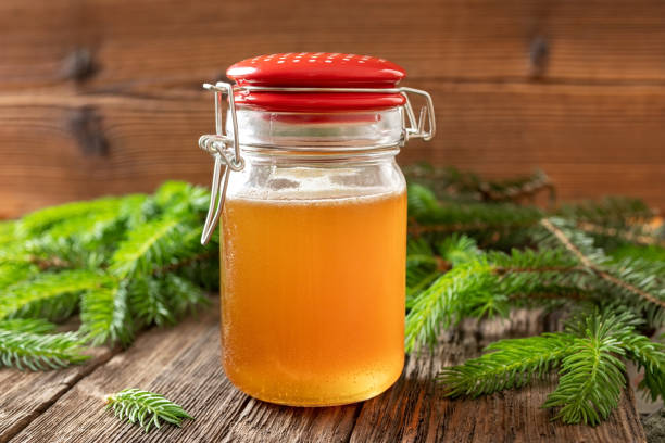 istock Homemade herbal syrup against cough made from young spruce tips 1154427084