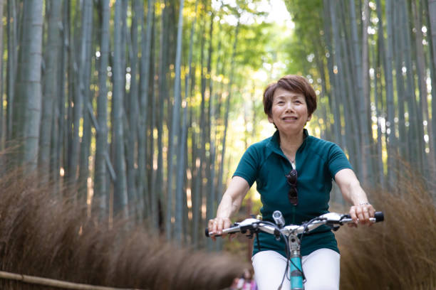 Senior woman cycling