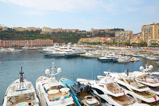 MONTE CARLO, MONACO - AUGUST 20, 2016: Monte Carlo harbor with boats and luxury yachts in a summer day in Monte Carlo, Monaco.